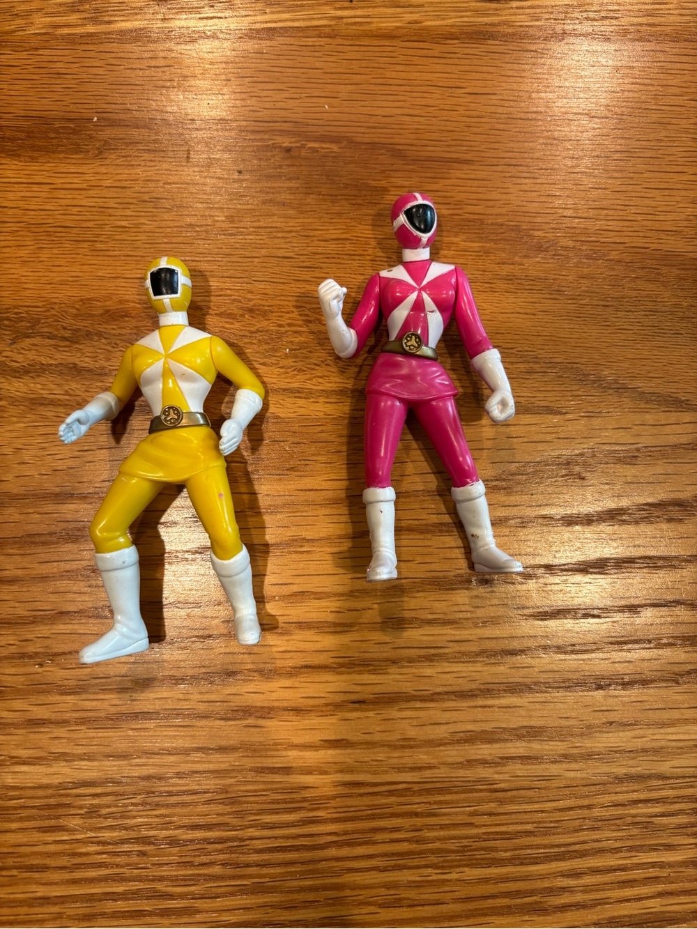 Pink and yellow power ranger figures
